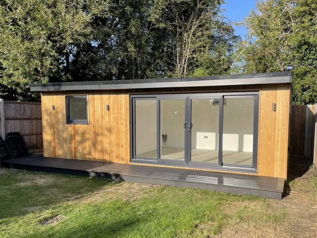 Garden room pinner larch cladding